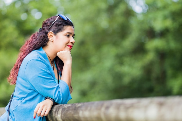 thinking outside in nature wellness self care relaxation south american woman in senda del oso