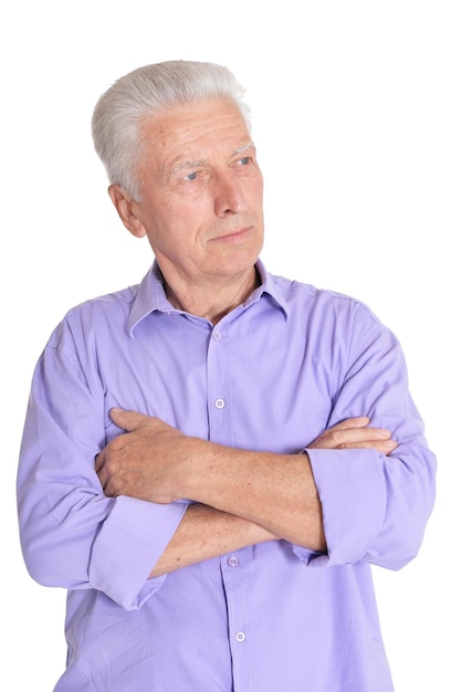 Thinking senior man isolated on white background