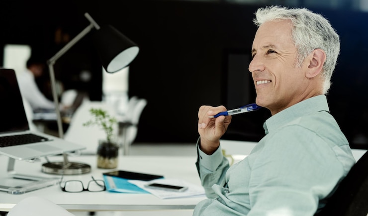 Photo thinking smile or mature businessman in office with ideas confidence and career growth happy economist project or proud financial analyst with research investments or finance security in germany