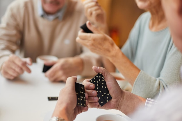 Thinking of strategy while playing dominoes