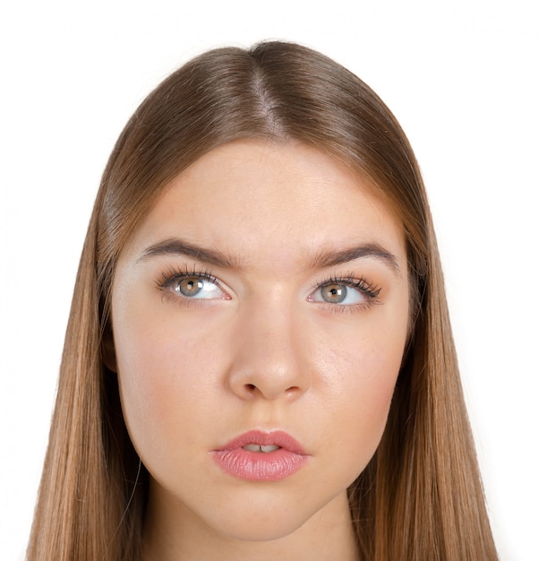 Thinking woman standing pensive contemplating looking skeptic