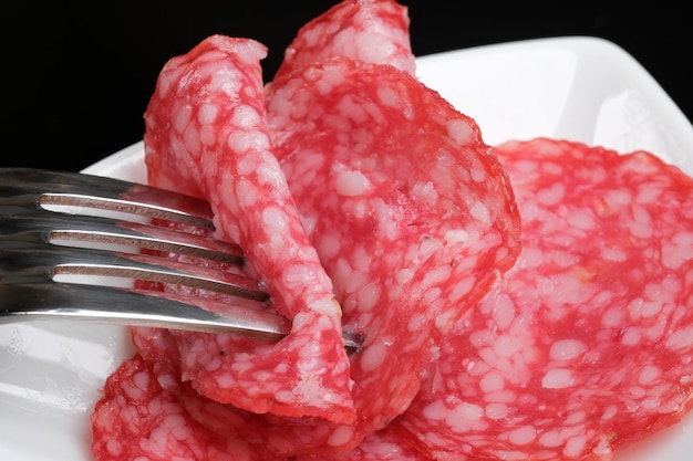 Thinly sliced delicious fragrant salami