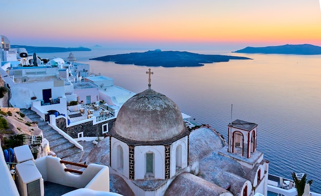 Thira town in Santorini island and the sea at sunset, Greece -  Greek landscape - cityscape