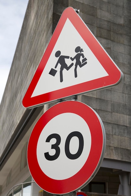 Thirty Speed Limit Traffic and School Sign