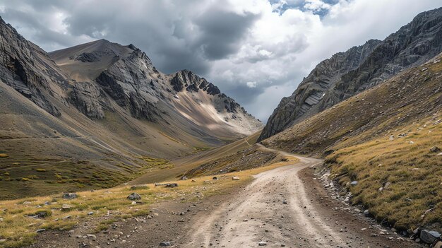 This is aof a mountain road The road is winding and narrow and it is surrounded by tall mountains