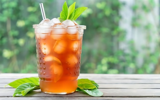 Photo this is iced lemon tea on leaf blurred background soft tone