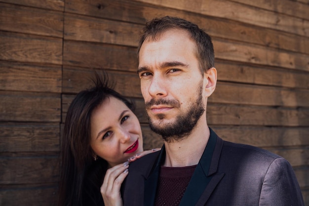 This is love girl with guy posing on a wooden background happy valentines day summer