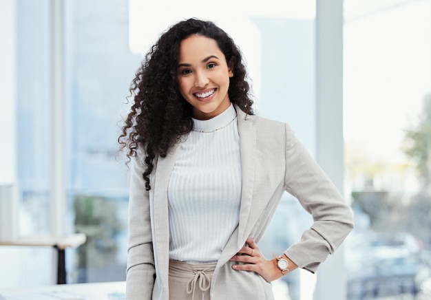 Photo this is what professional excellence looks like shot of a young businesswoman in her office