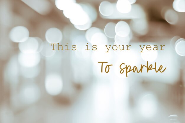 Photo this is your year to sparkle : positive motivation, life quote, inspiration on blur background