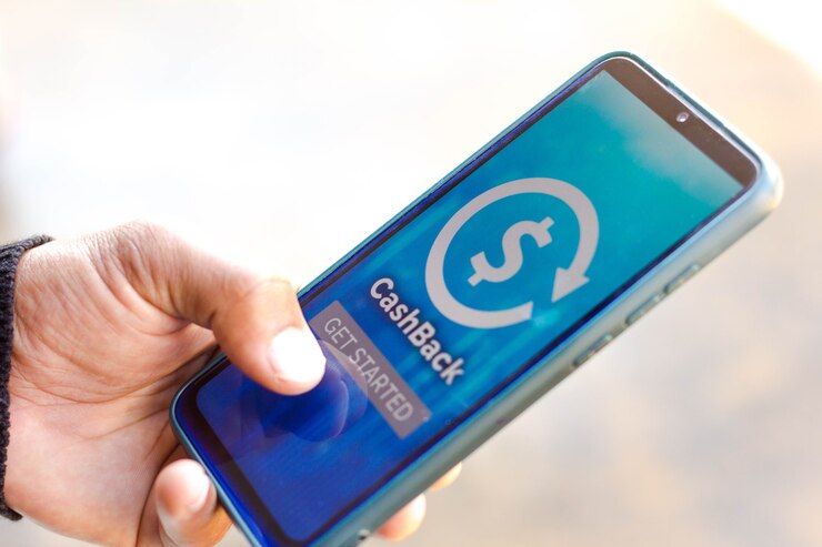 In this photo illustration the CashBack logo seen displayed on a smartphone