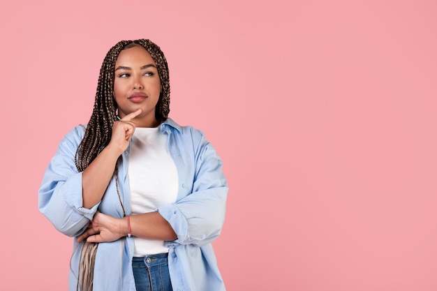 Thoughtful Black Obese Woman Thinking Looking Aside On Pink Background