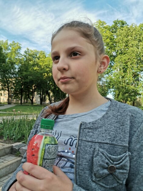 Thoughtful girl at park