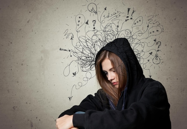 Thoughtful stressed young man with a mess