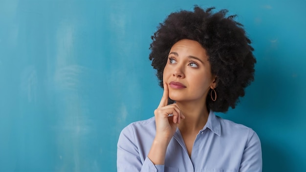 Thoughtful woman looking upper left corner thinking