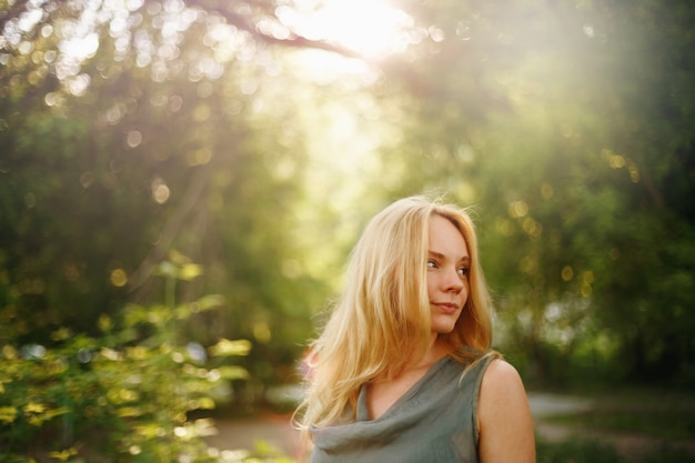 Thoughtful Woman in Summer Sunny Day