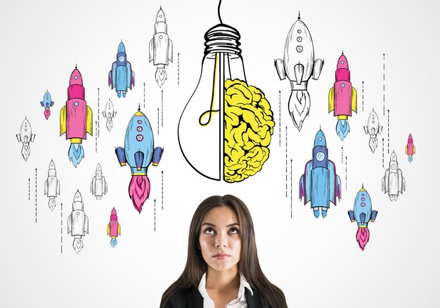 Thoughtful young businesswoman with creative lamp brain and rocket sketch on light background Startup brainstorm and idea concept