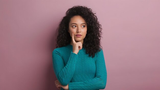 写真 thoughtful young woman in green knitted dress poses on isolated