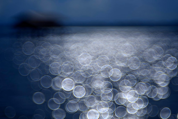 Thousand of bokeh rings at sea surface