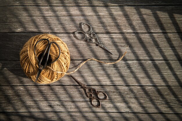 Threads and scissors on the bottom of the tree