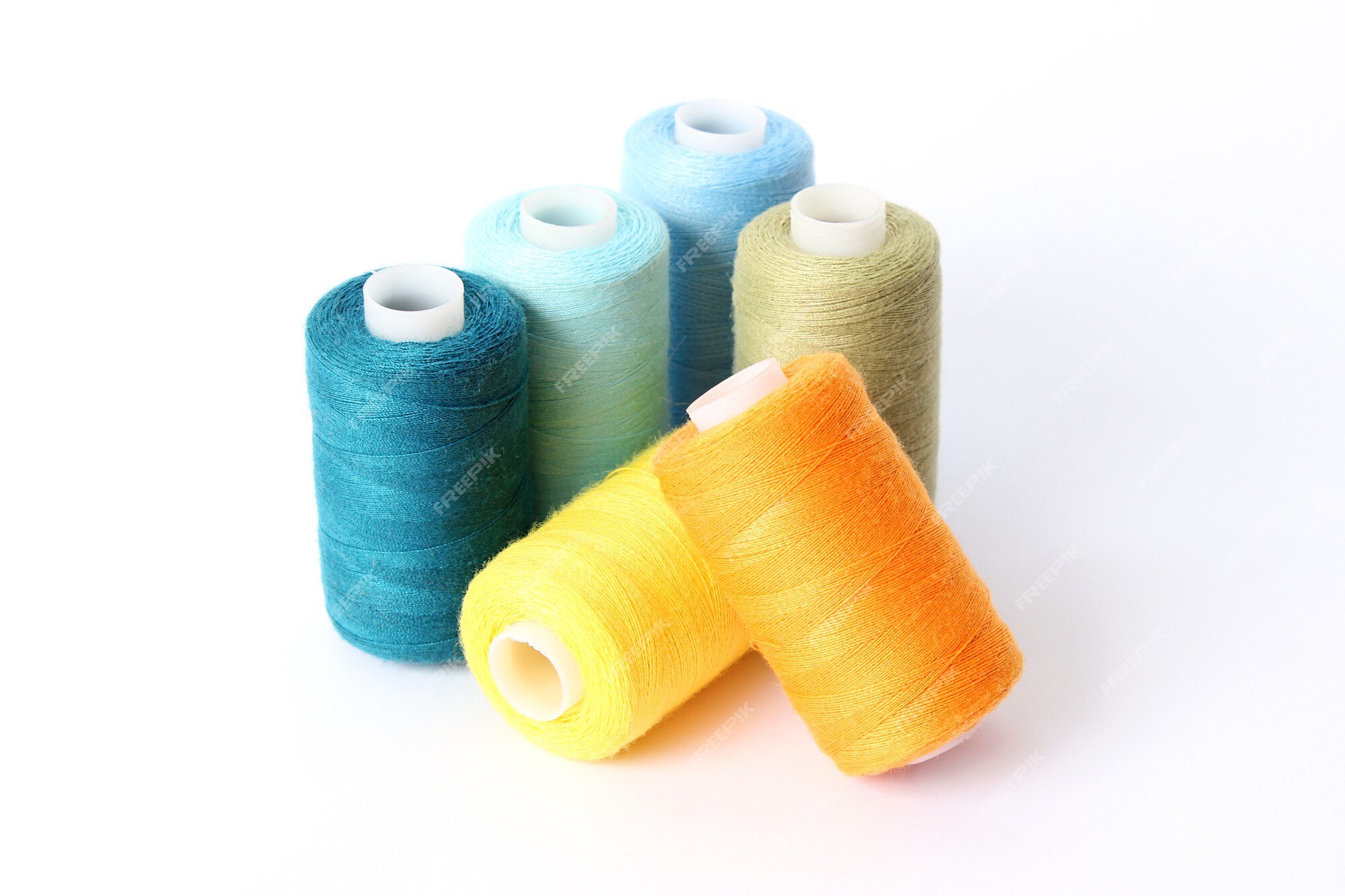 Premium Photo  Threads for sewing and needlework closeup sewing accessories