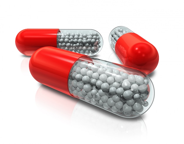 three 3d capsule pills isolated on white