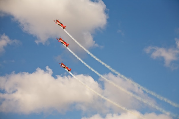 Three airplanes in formation on airshow