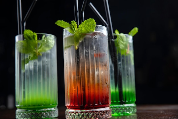 Three assorted cocktails at the bar