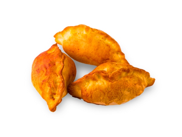 Three baked patties isolated on a white background.