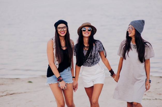 three beautiful girls on the beach