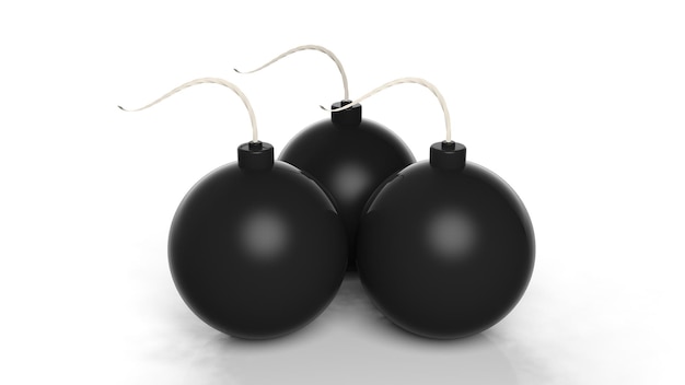 Foto tre bombe a palla di cannone nere isolate su sfondo bianco