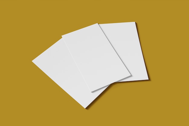 Three blank business or name cards on yellow