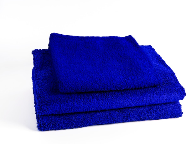 Three blue towels isolated