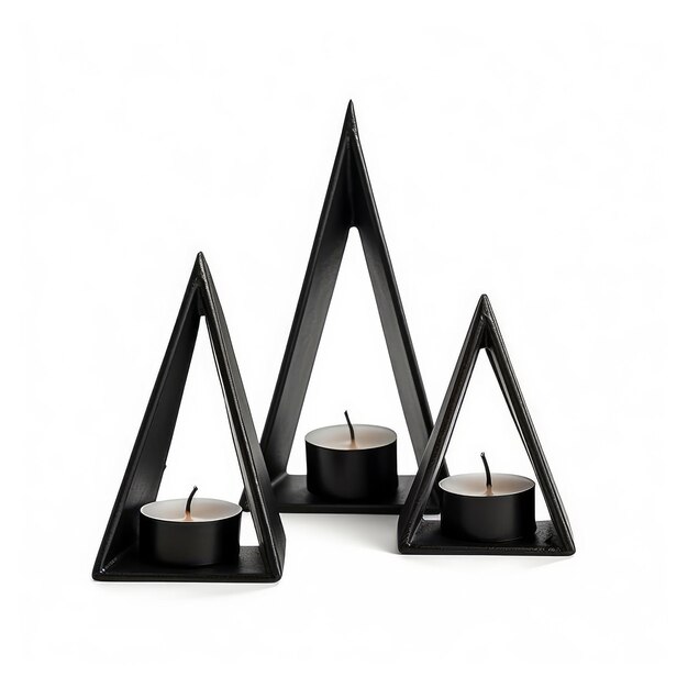 Three candles are displayed in a black glass display.