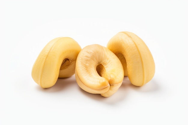 Three cashews on a white background