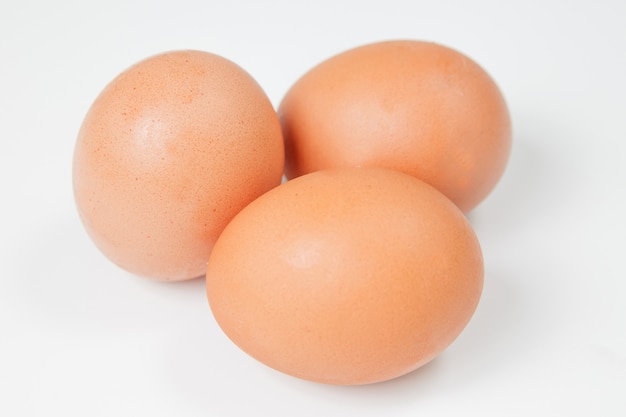 Three chicken eggs