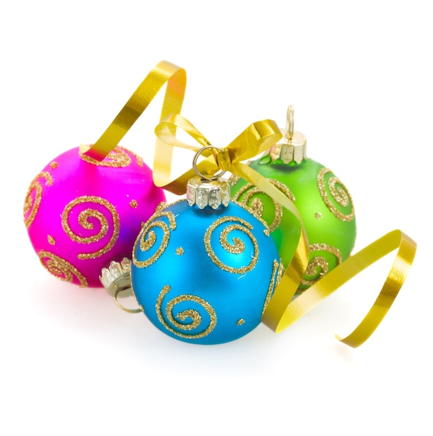 Three christmas balls blue, green and pink isolated