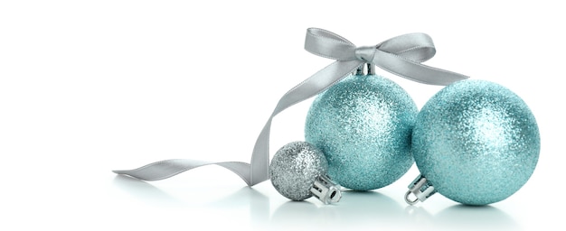 Three Christmas baubles isolated on white background