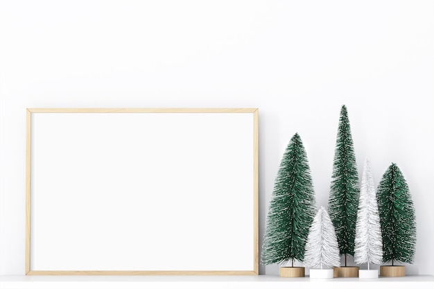 Three christmas trees in a frame on a white background frame mockup