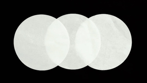 Three circles of paper