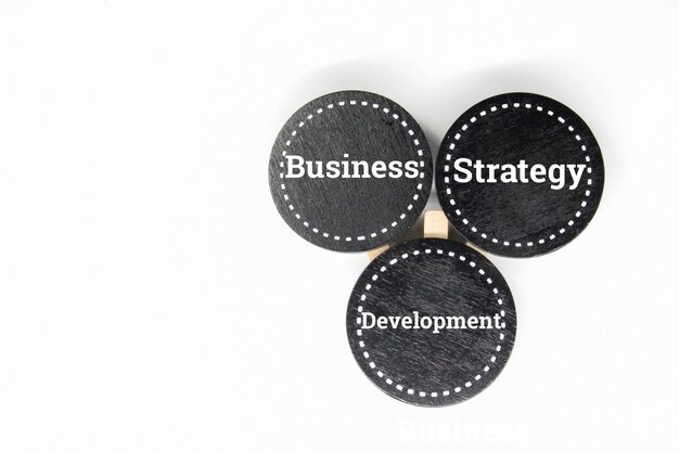 Three circular buttons with the words business and strategy on them