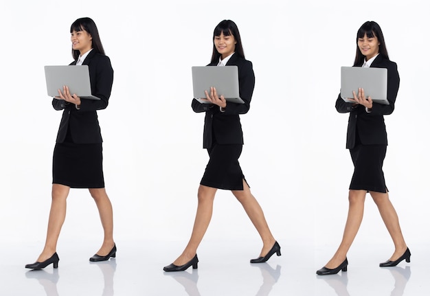 Tre collage tutta la lunghezza degli anni '20 affari asiatici in ufficio donna nera capelli corti indossare gonna abito scuro e scarpe. la femmina porta il laptop per lavorare e camminare vista laterale su sfondo bianco isolato