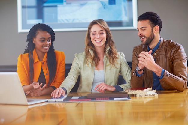 Three colleagues at business meeting