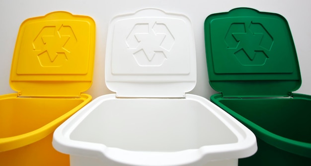 Three colorful trash cans for sorting garbage For plastic glass and paper