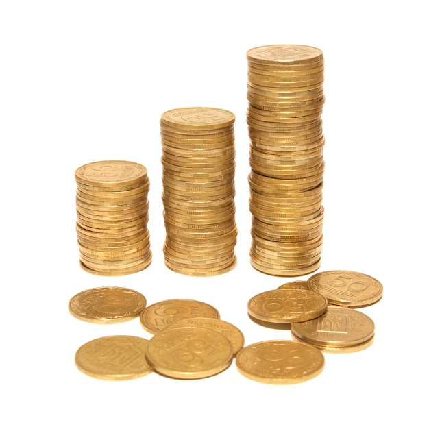 Three columns of gold coin isolated