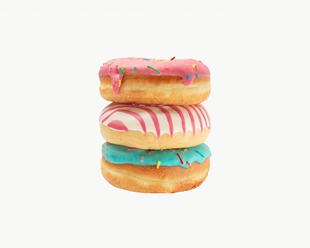 Three donuts in glaze with colored sprinkles on a white