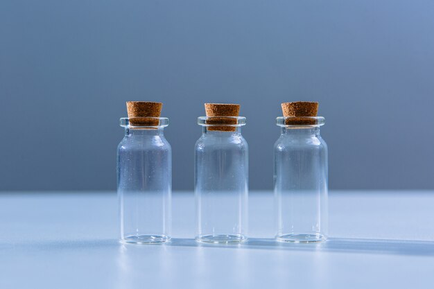 Three empty beakers or test tubes