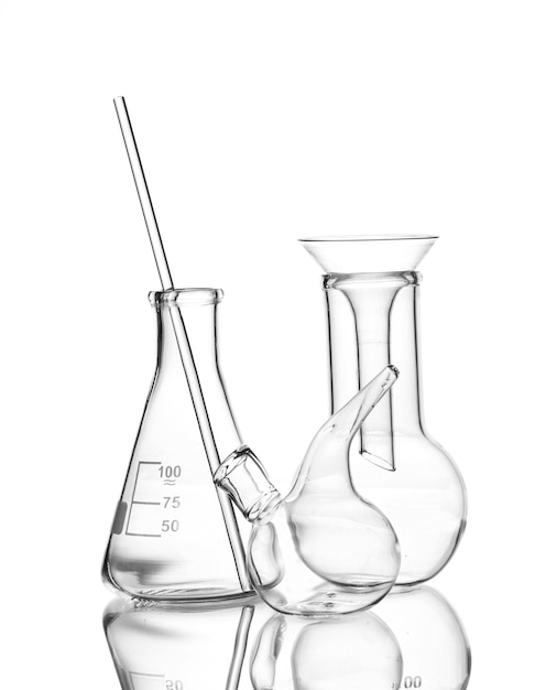 Three empty laboratory glassware with reflection isolated on white