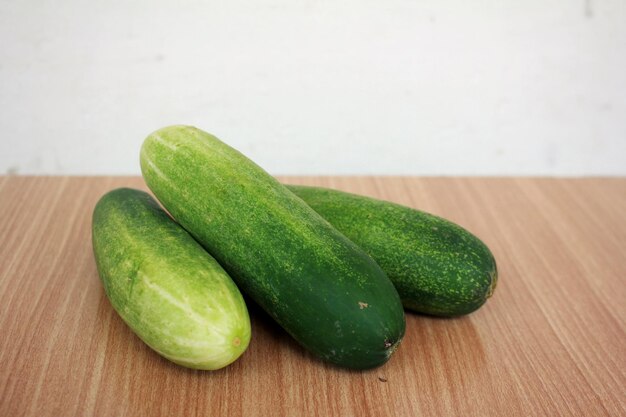 Three Fresh Cucumbers On The Table