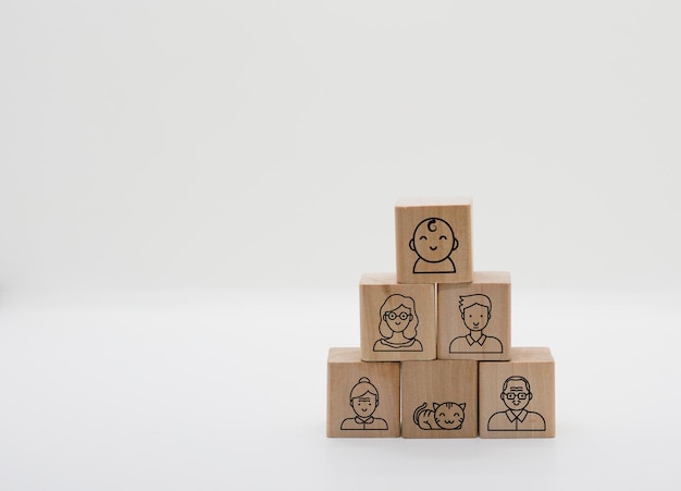 three generation icons on minimal wood blocks in family generations together happiness concept