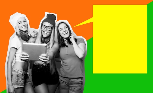 Three girls friends taking selfie with digital tablet